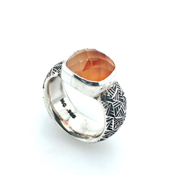 Faceted Carnelian in a Handstamped Silver Band by Matthieu Cheminée