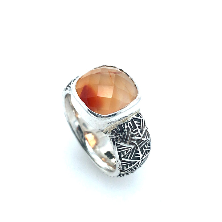 Faceted Carnelian in a Handstamped Silver Band by Matthieu Cheminée